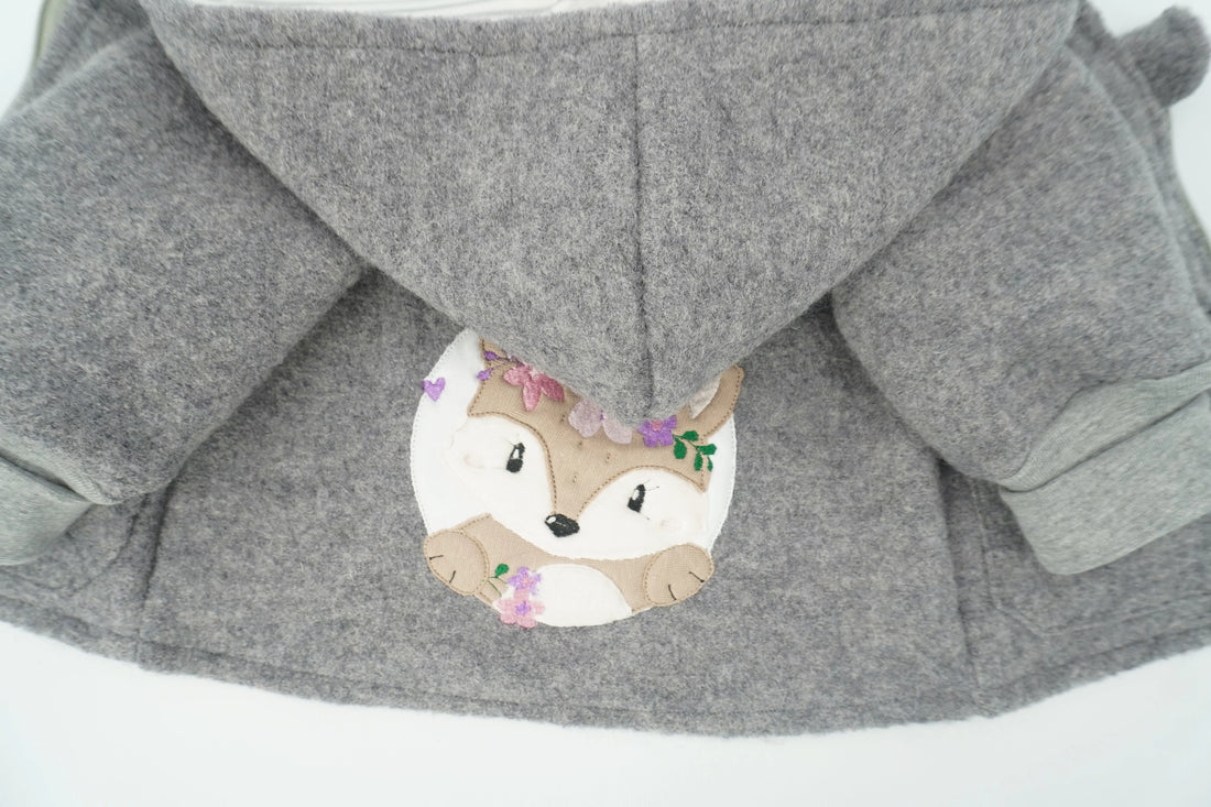 Walk Jacke für Babys und Kinder mit Applikation