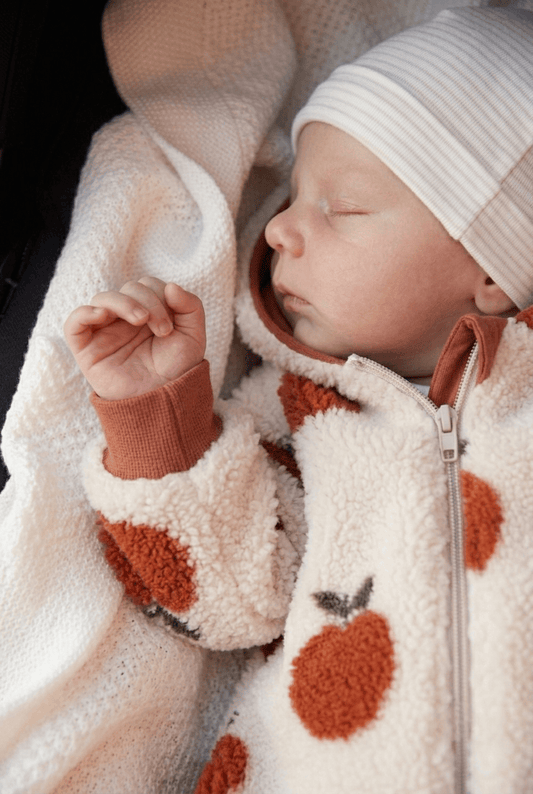 in Deutschland angefertigter Babyoverall aus Teddyfleece