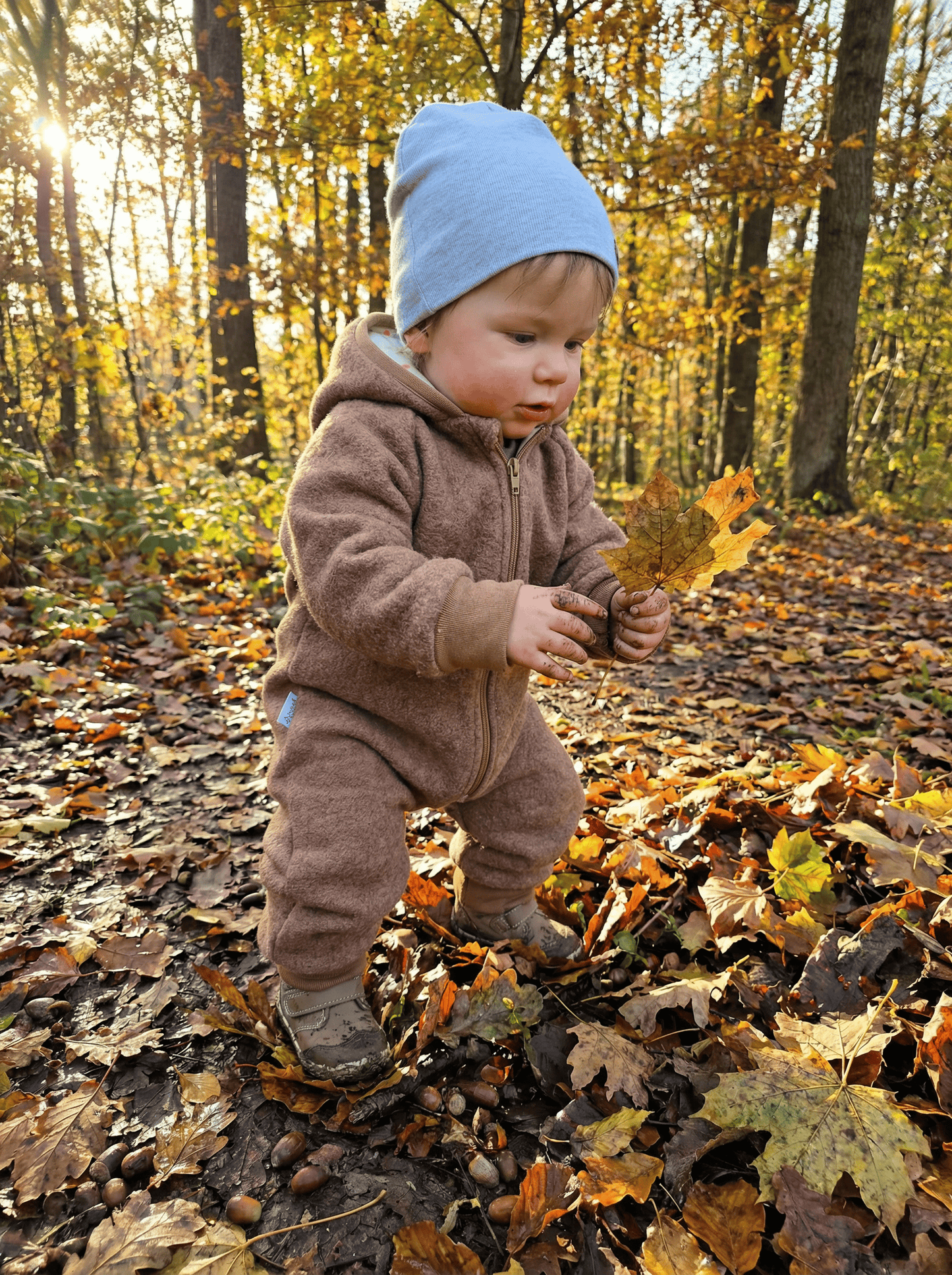 In Deutschland handgemachter Overall aus Walkloden in Beige. 