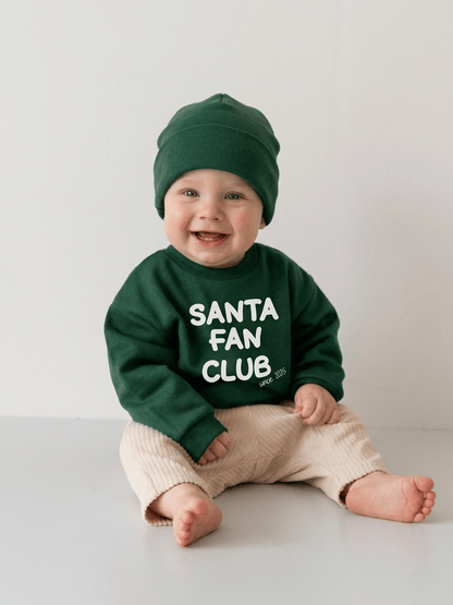 Baby und Kleinkinder Pullover Santa Fan Club, individuell Personalisierbar mit Jahreszahl. Perfektes Outfit für Weihnachten oder als Geschenk zum ersten Weihnachtsfest. Handgemacht in Deutschland